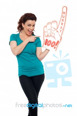 Girl Wearing Boo Hurray Foam Glove Stock Photo