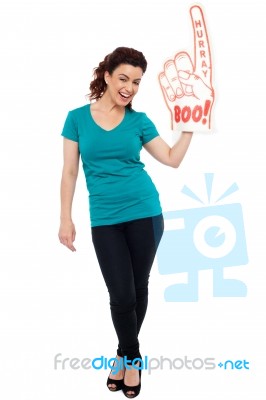 Girl Wearing Boo Hurray Foam Glove Stock Photo