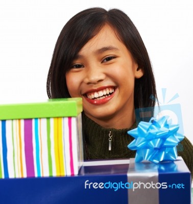 Girl With Birthday Gifts Stock Photo