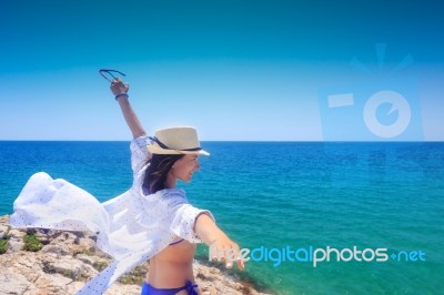 Girl With Hands Up Stock Photo