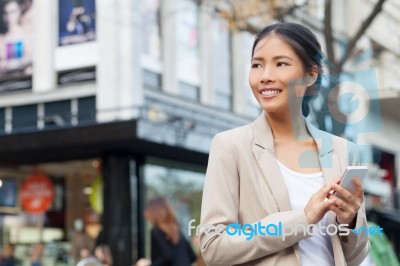 Girl With Mobile Phone Stock Photo