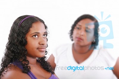 Girl With Unhappy Mother Stock Photo