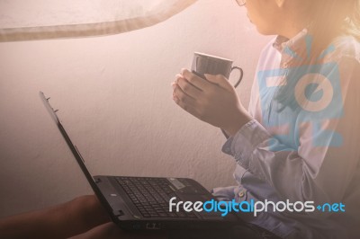 Girls Are Drinking Coffee In Room Stock Photo