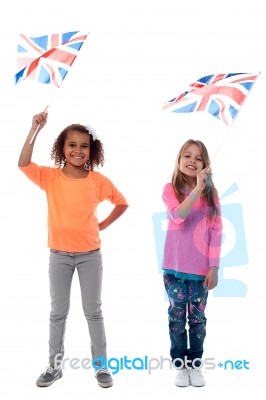 Girls Waving United Kingdom Flags Stock Photo