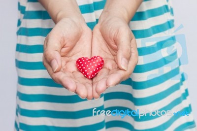 Giving Love,hands Holding Red Heart Symbol,love Concept And Ideas Stock Photo