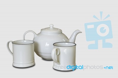 Glass And Kettles Is Made From Ceramic Tile On A White Background With Clipping Path Stock Photo