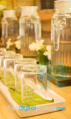 Glass And Water Bottle For Drinking Corner Stock Photo