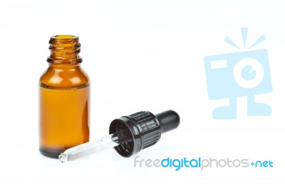 Glass Jar And Dropper Stock Photo