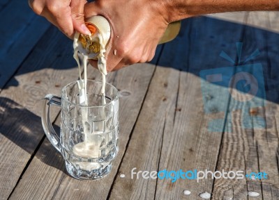 Glass Mug With Beer On The Table In The Park Stock Photo