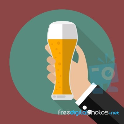 Glass Of Beer In Hand Stock Image