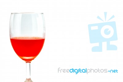 Glass Of Champagne With Red Wine Stock Photo