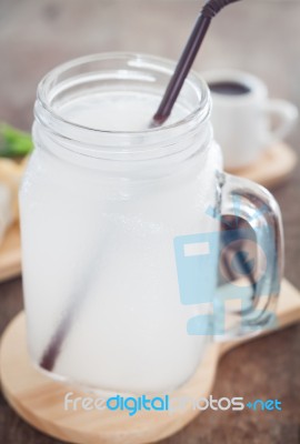 Glass Of Fresh Coconut Water Stock Photo