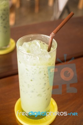 Glass Of Iced Green Tea Latte Stock Photo