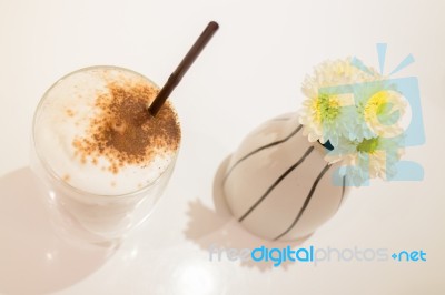 Glass Of Iced Milk Coffee Drink Stock Photo