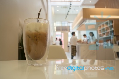 Glass Of Iced Milk Coffee Drink Stock Photo