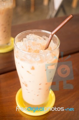 Glass Of Iced Thai Milk Tea Stock Photo