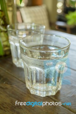 Glass Of Melt Iced Water Stock Photo