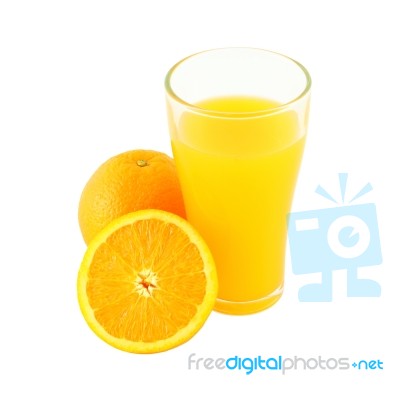 Glass Of Orange Juice And Riped Fruit Side On White Background Stock Photo