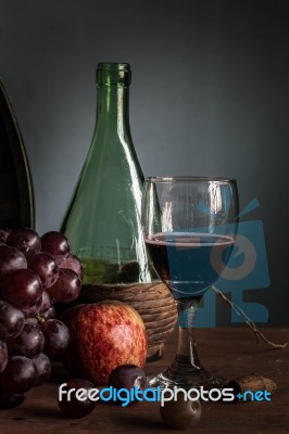 Glass Of Red Wine With Dark Shadows Stock Photo