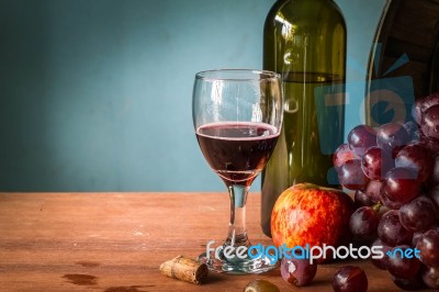 Glass Of Wine On Wooden Stock Photo