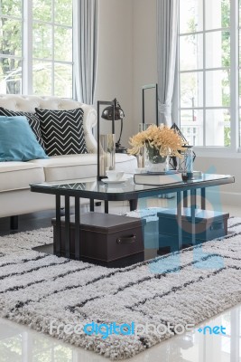 Glass Table With Vase Of Flower On Carpet In Classic Living Room… Stock Photo