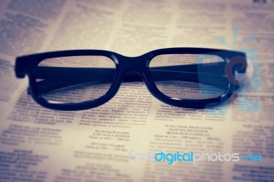 Glasses And Newspaper Stock Photo