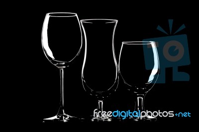 Glasses For Wine, Beer And Cocktail On Black Background Stock Photo