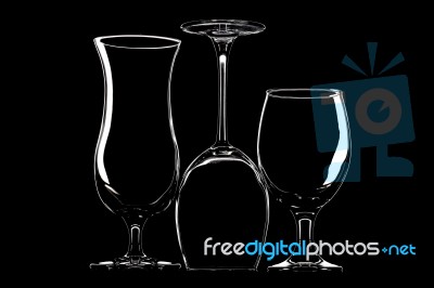 Glasses For Wine, Beer And Cocktail On Black Background Stock Photo