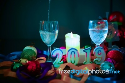 Glasses Of Champagne And New Year Decorations Stock Photo