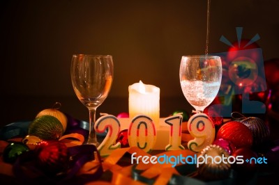 Glasses Of Champagne And New Year Decorations Stock Photo