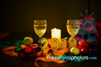 Glasses Of Champagne And New Year Decorations Stock Photo