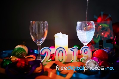 Glasses Of Champagne And New Year Decorations Stock Photo