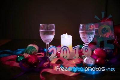 Glasses Of Champagne And New Year Decorations Stock Photo