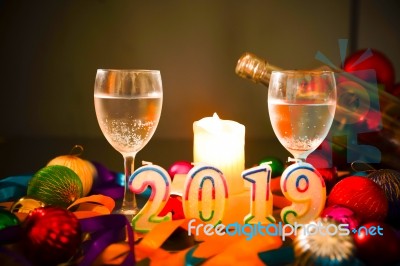 Glasses Of Champagne And New Year Decorations Stock Photo