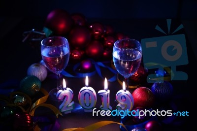 Glasses Of Champagne And New Year Decorations Stock Photo