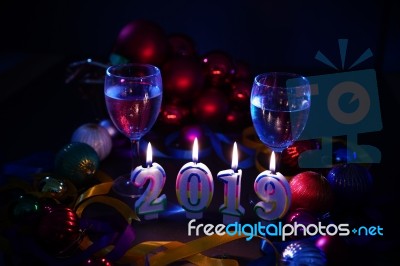 Glasses Of Champagne And New Year Decorations Stock Photo