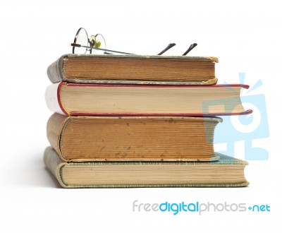 Glasses on Old Books Stock Photo