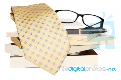 Glasses, Pile Of Books And Tie  Stock Photo