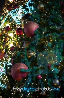 Glitter Red Ball Celebrate Christmas On Tree With Wire White Light Vignette Background Stock Photo