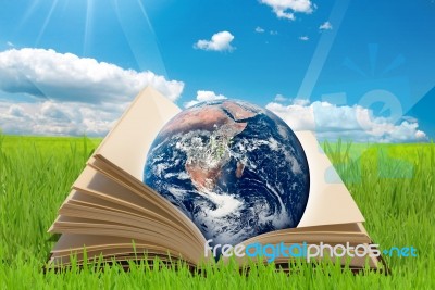 Globe On Book Stock Image