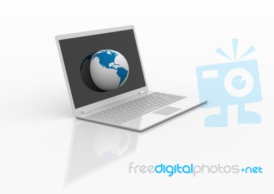 Globe On Laptop Stock Image