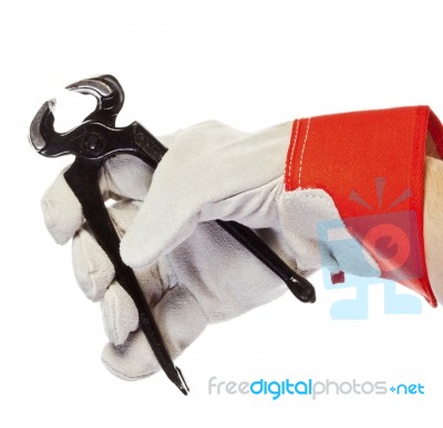 Glove Hand Holding Pincer Stock Photo