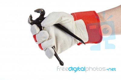 Glove Hand Holding Pincer Stock Photo