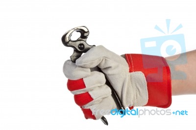 Glove Hand Holding Pincer Stock Photo