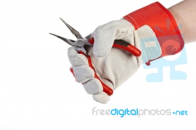 Glove Hand Holding Pliers Stock Photo