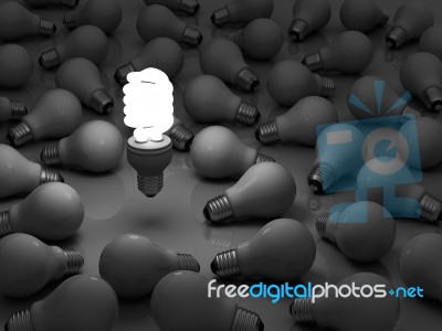 Glowing Energy Saving Light Bulb Stock Image