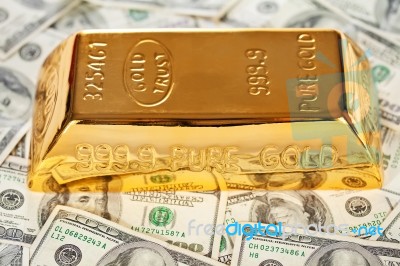 Gold And Money Stock Photo