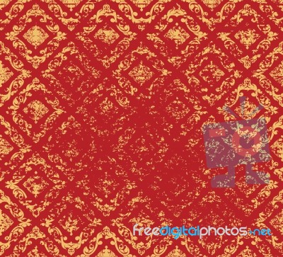 Gold Art Pattern On A Red Grunge Scene Stock Image