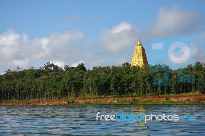 Gold Buddha Gaya Near A River Stock Photo