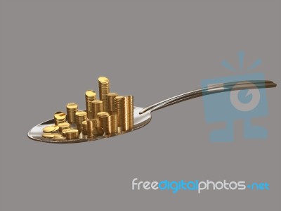 Gold Coins On A Silver Spoon Stock Image